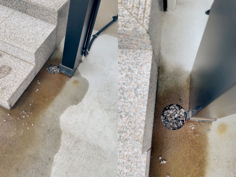 カーポートの柱のまわりのコンクリートに残った雨だれの跡